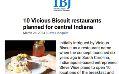 Screenshot of an Indianapolis Business Journal article headline about 10 Vicious Biscuit brunch restaurants planned for central Indiana, featuring an image of a breakfast biscuit dish topped with delicious, full-of-flavor gravy.